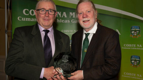 01-04-22. Meath GAA Annual Sponsors Night and Club Awards Presentations 2020/2021 at the Castle Arch Hotel, Trim.
Joseph O’Brien (Right), Meath GAA Cultural Committee Chairman making a presentation to retired Meath Chronicle Sports Editor, Conall Collier.
Photo: John Quirke / www.quirke.ie
©John Quirke Photography, 16 Proudstown Road, Navan.  Co. Meath. 046-9028461 / 087-2579454.